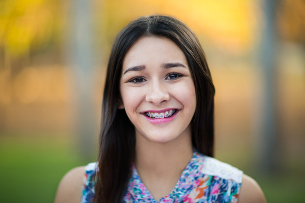 Smiling girl with braces